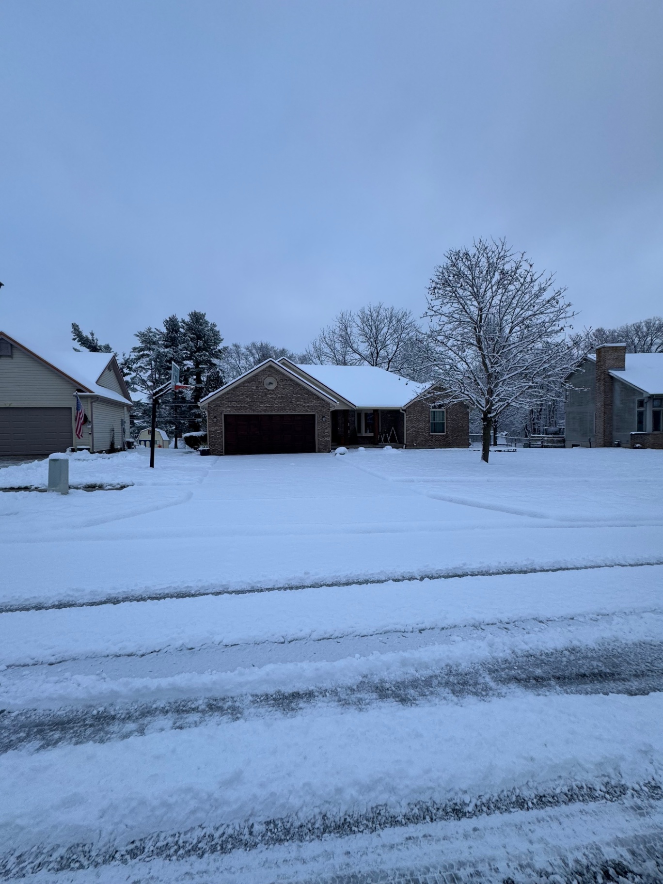 Snow-covered driveway before plowing