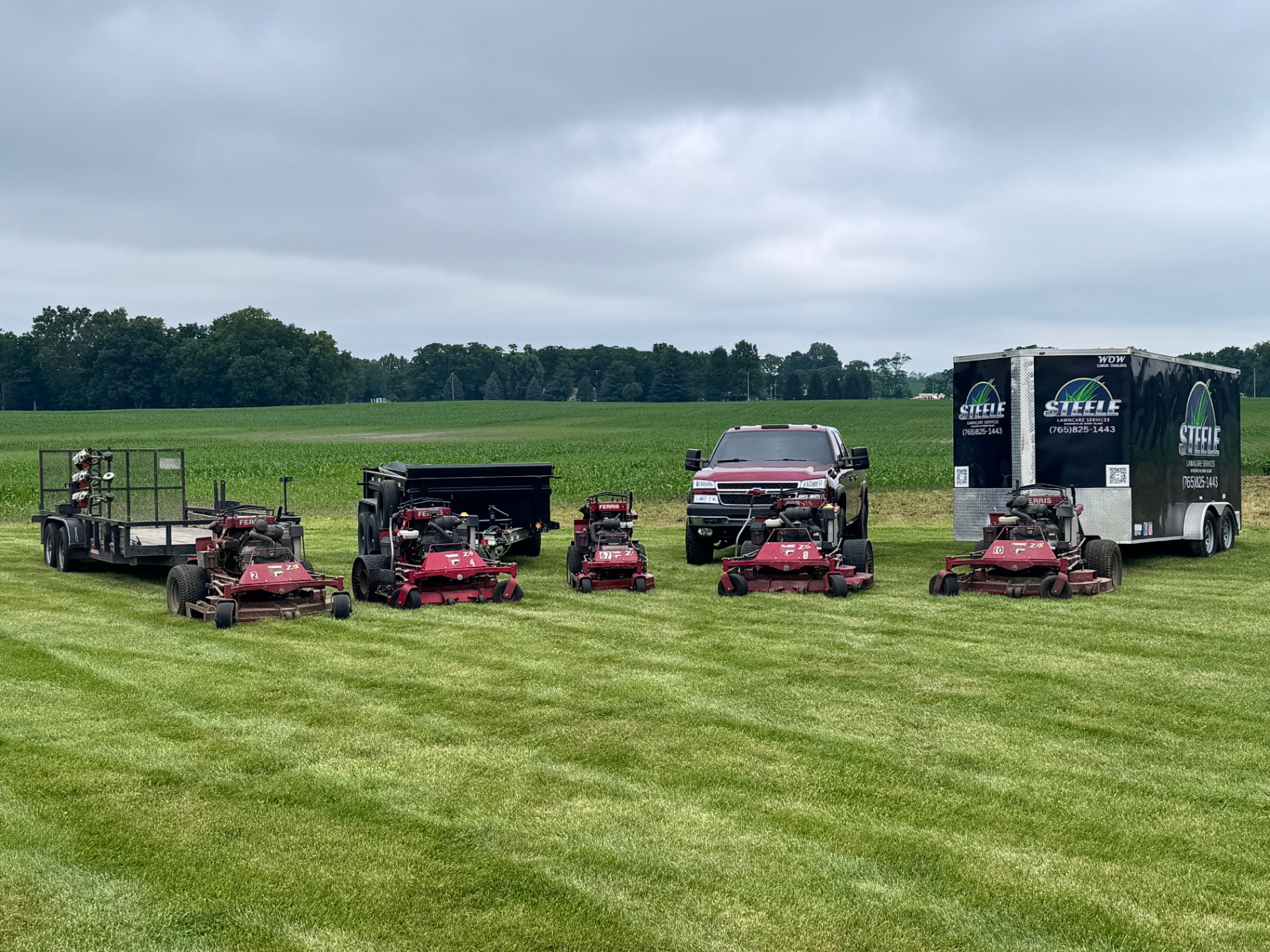 Steele Lawncare truck, trailer, and mower fleet