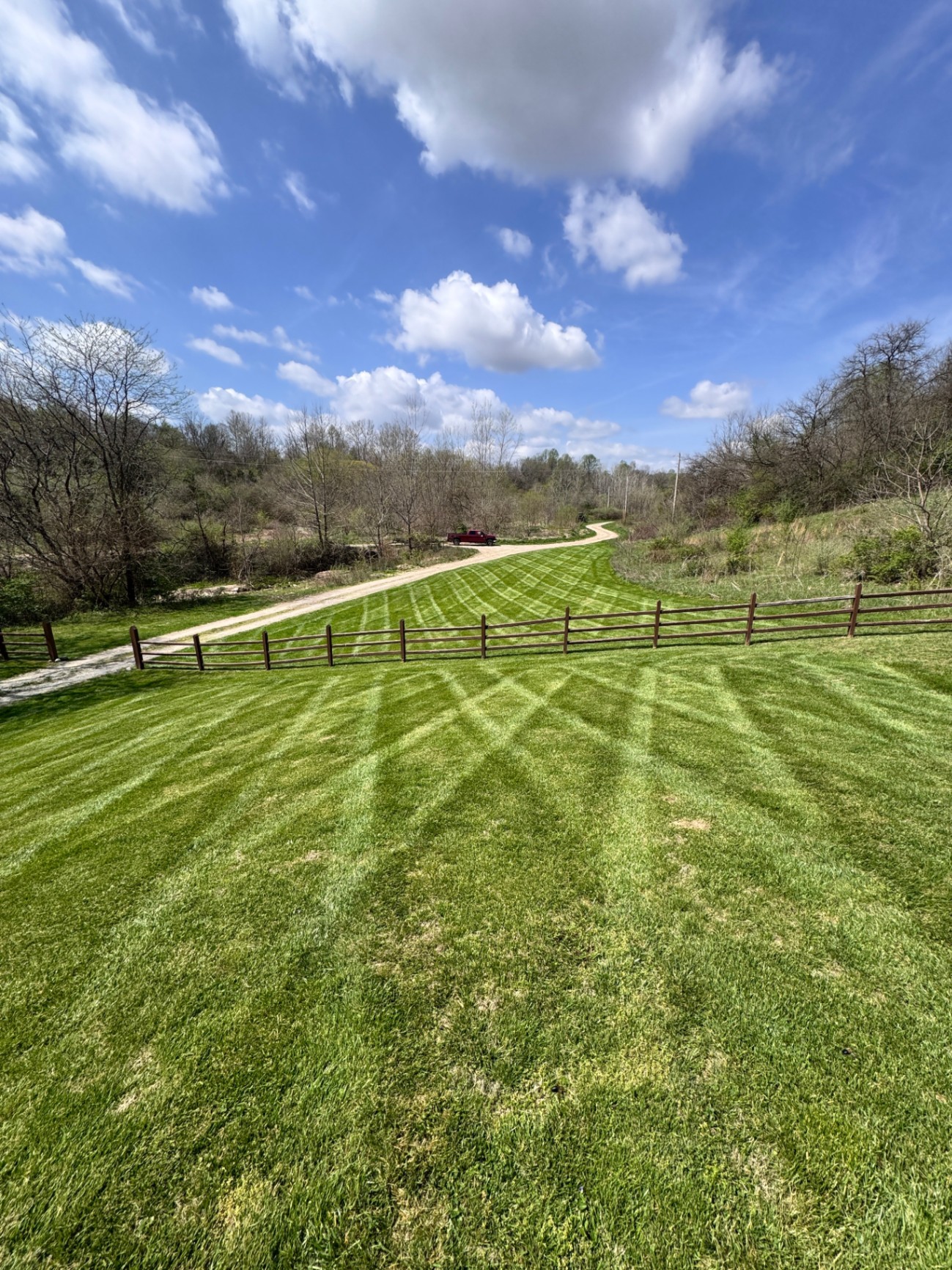 Fresh mow along a split-rail fence