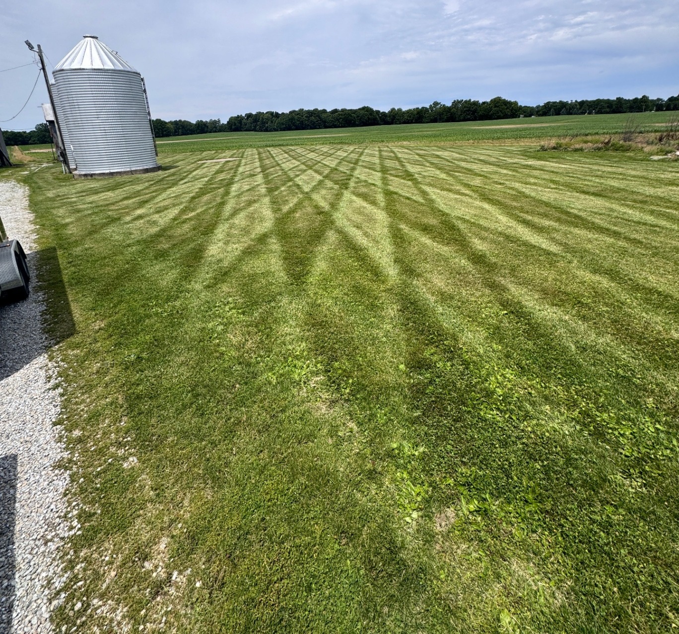Crosshatch pattern beside a grain bin