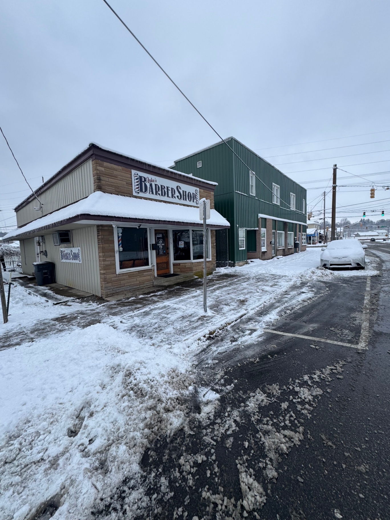 Commercial storefront cleared of snow