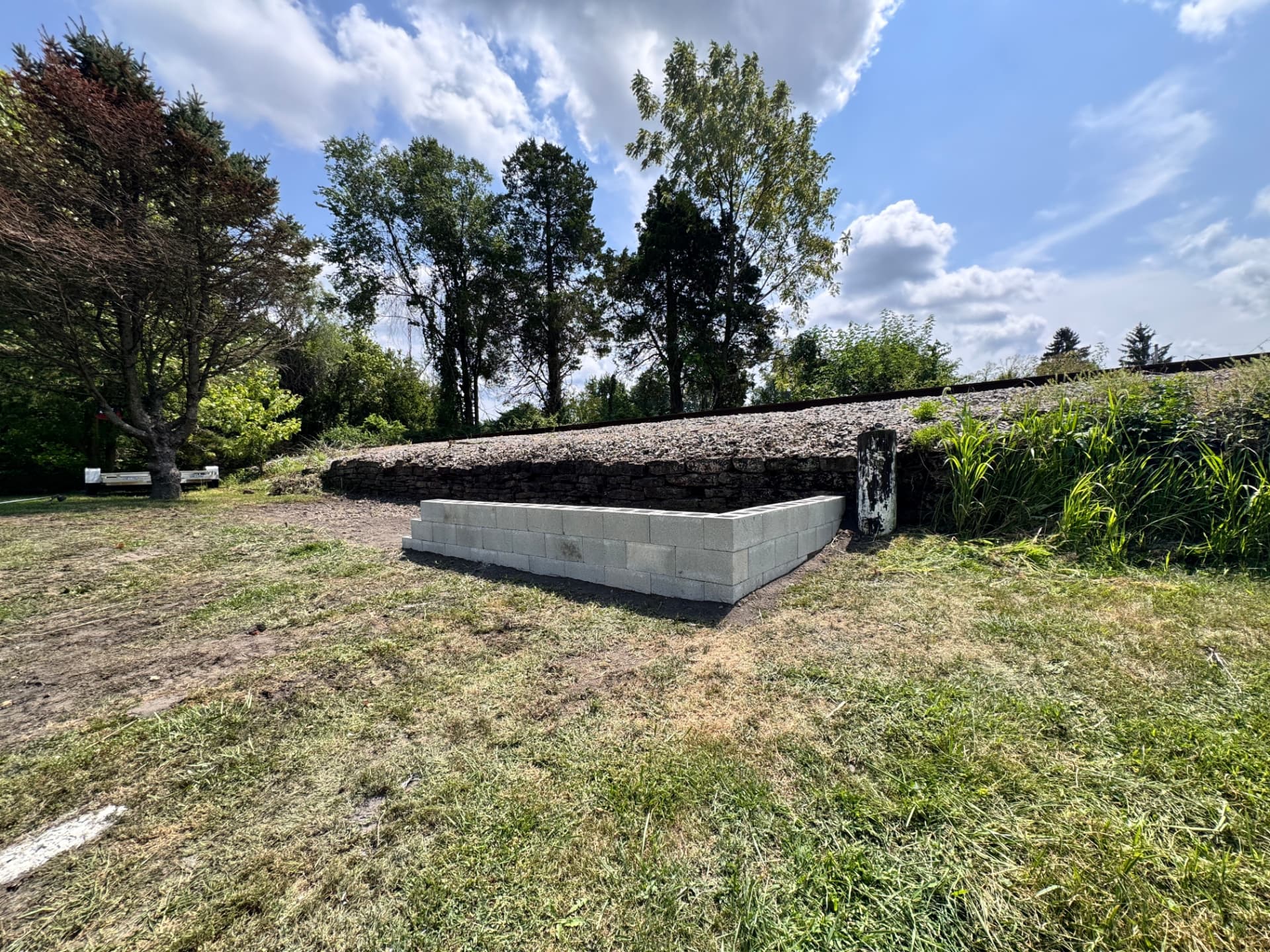 Finished burn pit and retaining wall