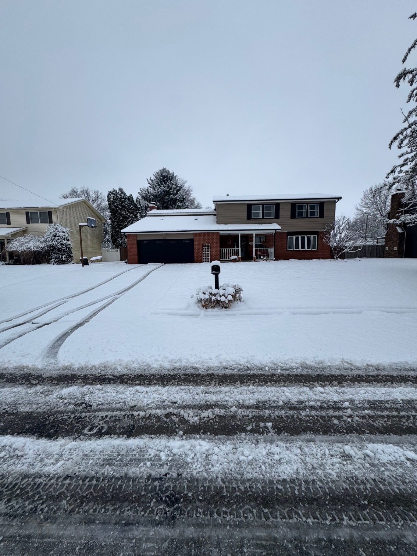 Snow-covered driveway before plowing